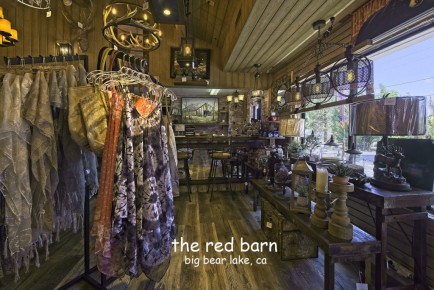 The Red Barn 532 Badger Lane Big Bear Lake, CA 92315,  (909)878-4080   
https://theredbarnbigbear.com/  info@theredbarnbigbear.com
The Red Barn is a one of a kind unique store that blends the Bear and Rooster where you will find not only the largest selection of exceptional mountain, cabin and lodge lighting but also an unsurpassed selection of farmhouse accessories, furniture and home décor. We have sourced incredible vintage purses and bags from around the world. We carry a large selection of gourmet food items that will impress even the finest Chefs; like party dips, no bake desserts, chocolates, candy, pie fillings, jams and grilling sauces. We also offer delicious local pure honey from Temecula Valley and a selection of the finest Maple Syrups from Vermont. Another amazingly unique experience that you will find at The Red Barn is Big Bear’s only Olive Oil and Balsamic Vinegar Tasting Bar. We have a selection of over 20 gourmet Olive Oils and Balsamic Vinegars that foodies can come and sample for free!
